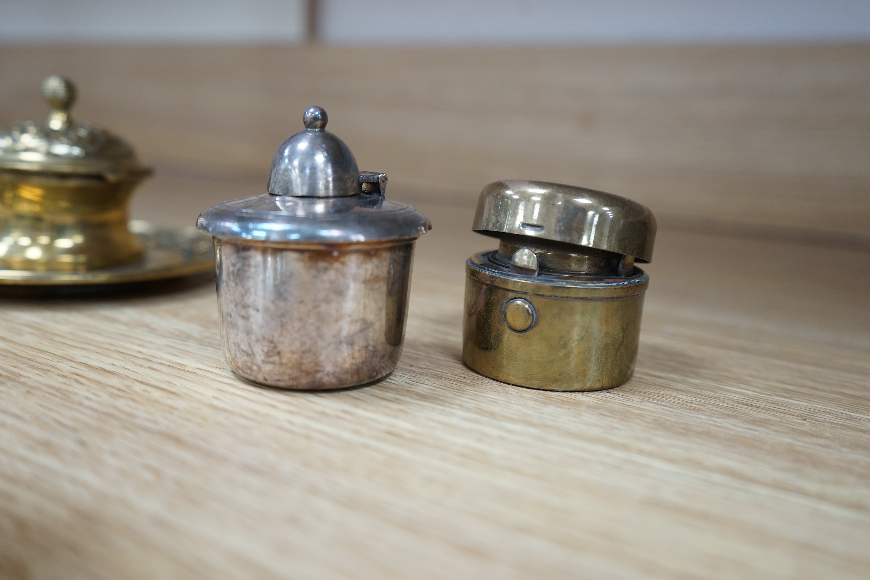 Eleven various 19th century and later inkwells, mostly brass. Condition varies